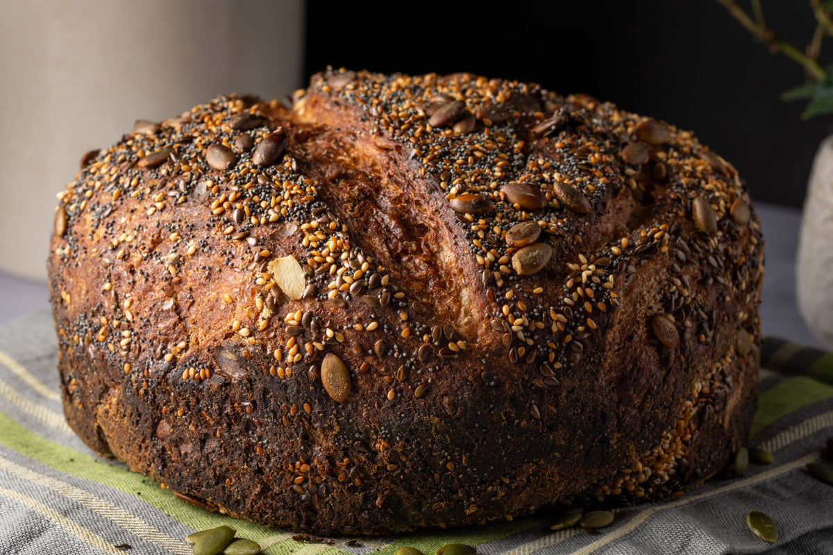 Bread topped with sesame and pumpkin seeds