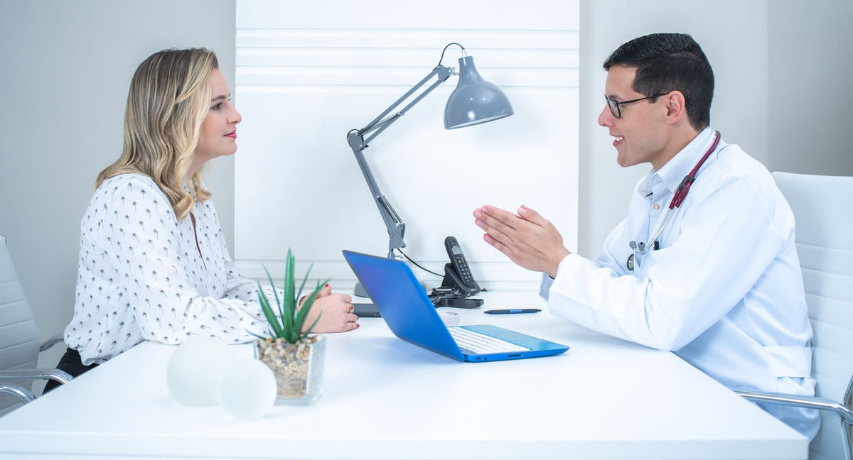 Doctor and patient in a bright office