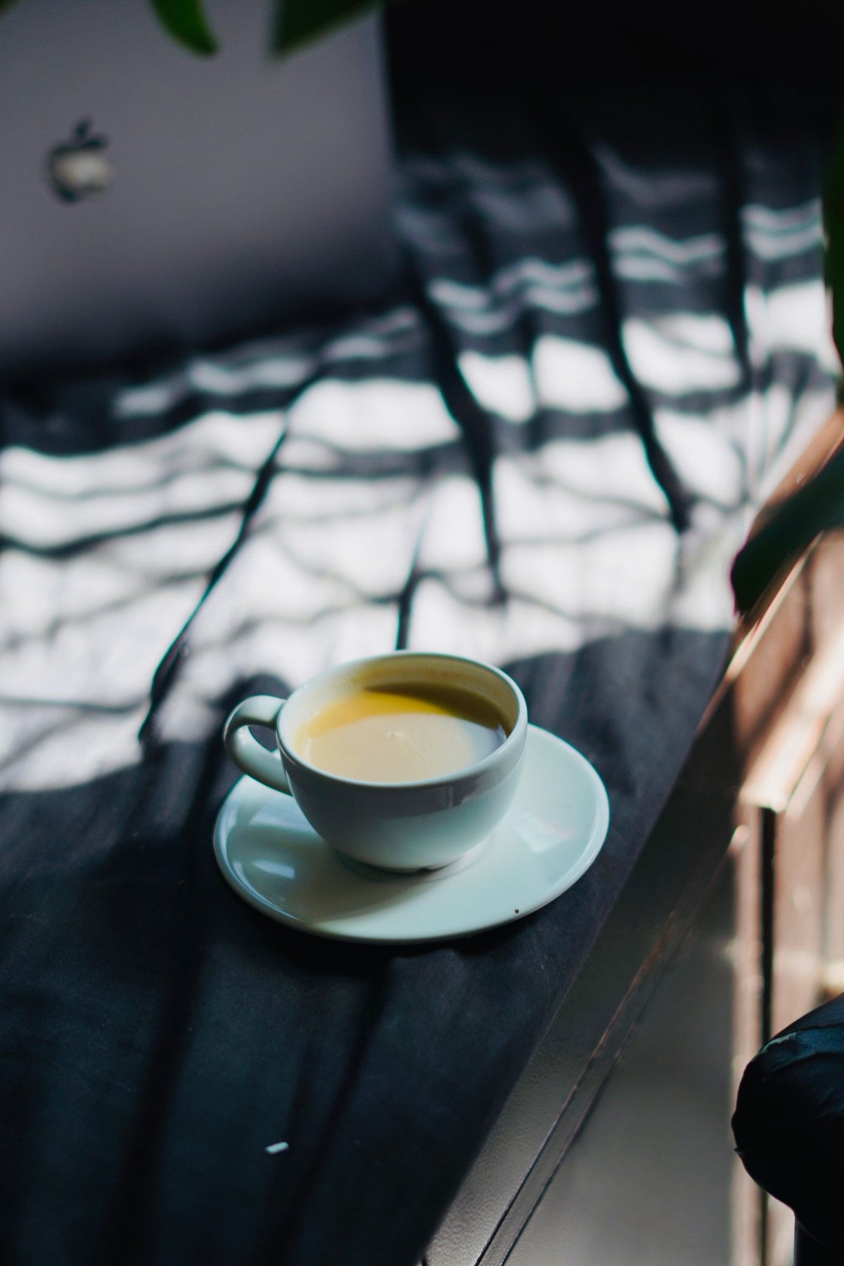 Cup of coffee in sunlight