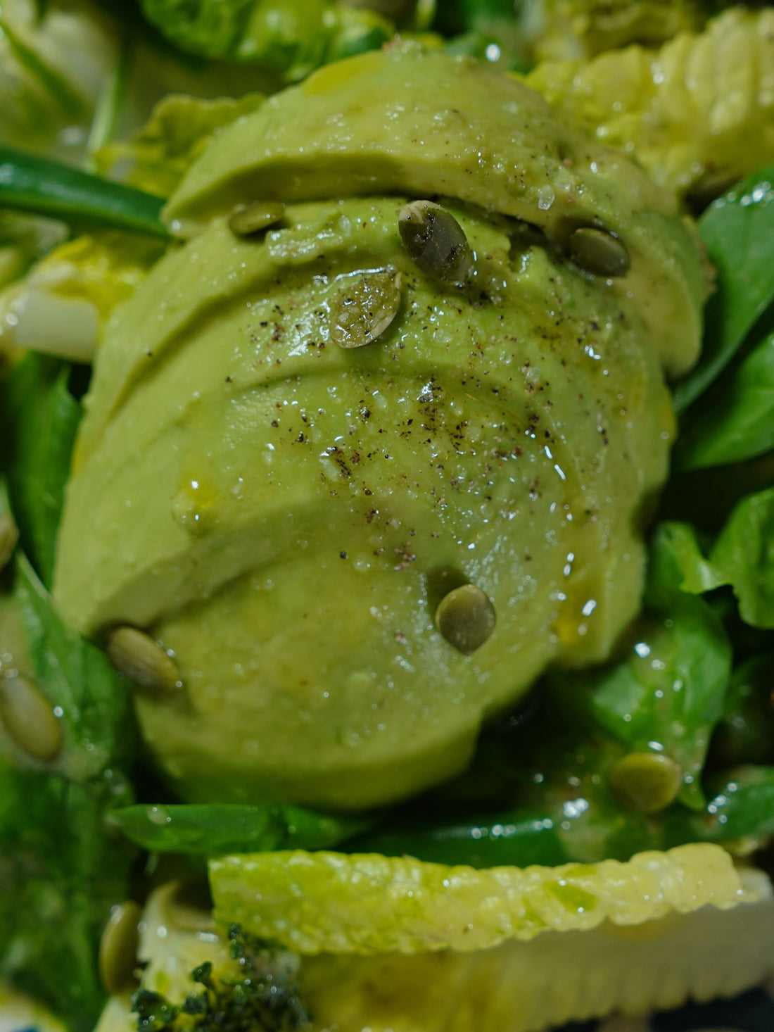 Salad with avocado and pumpkin seeds