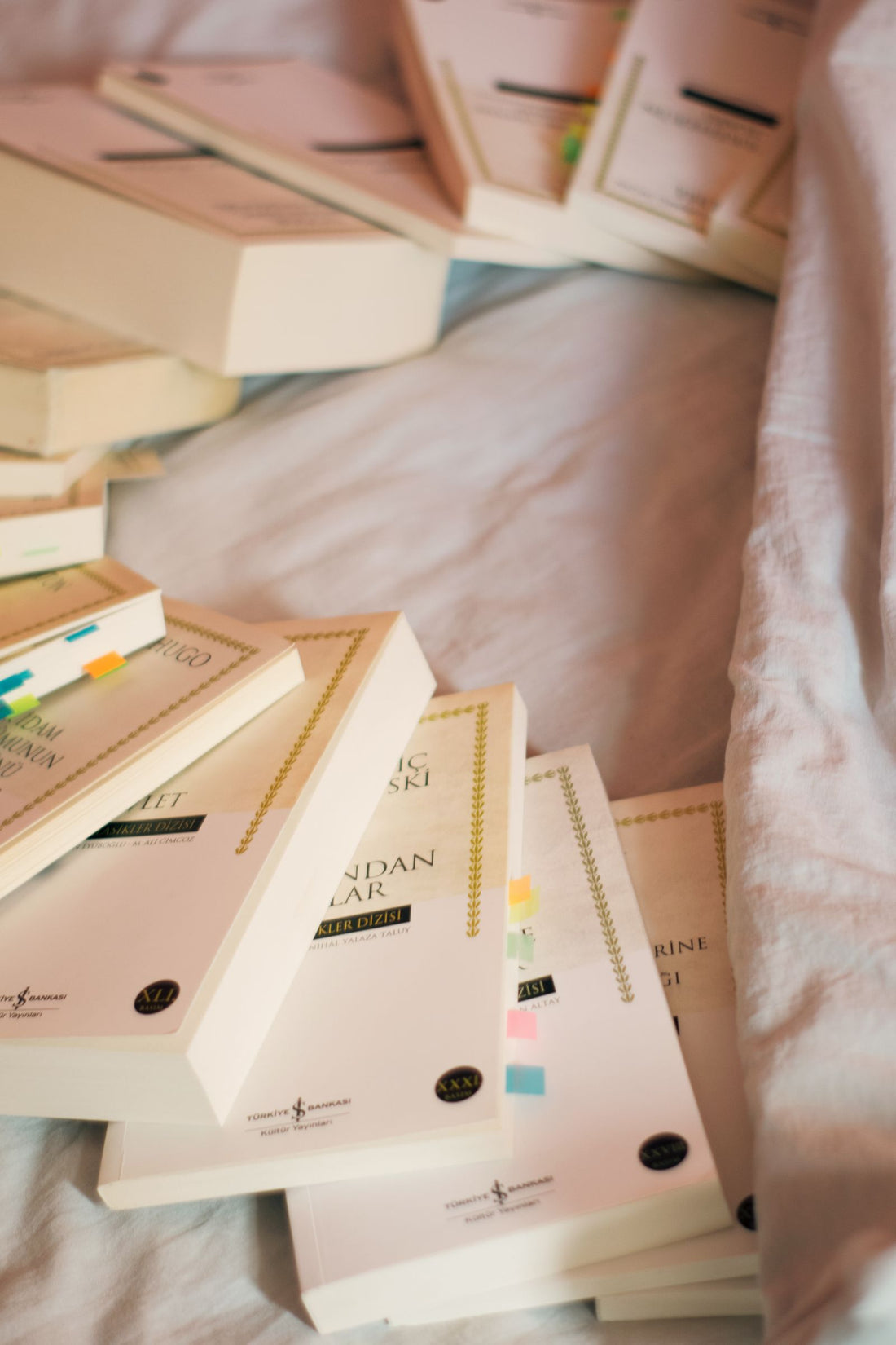 Stack of books with coloured tabs