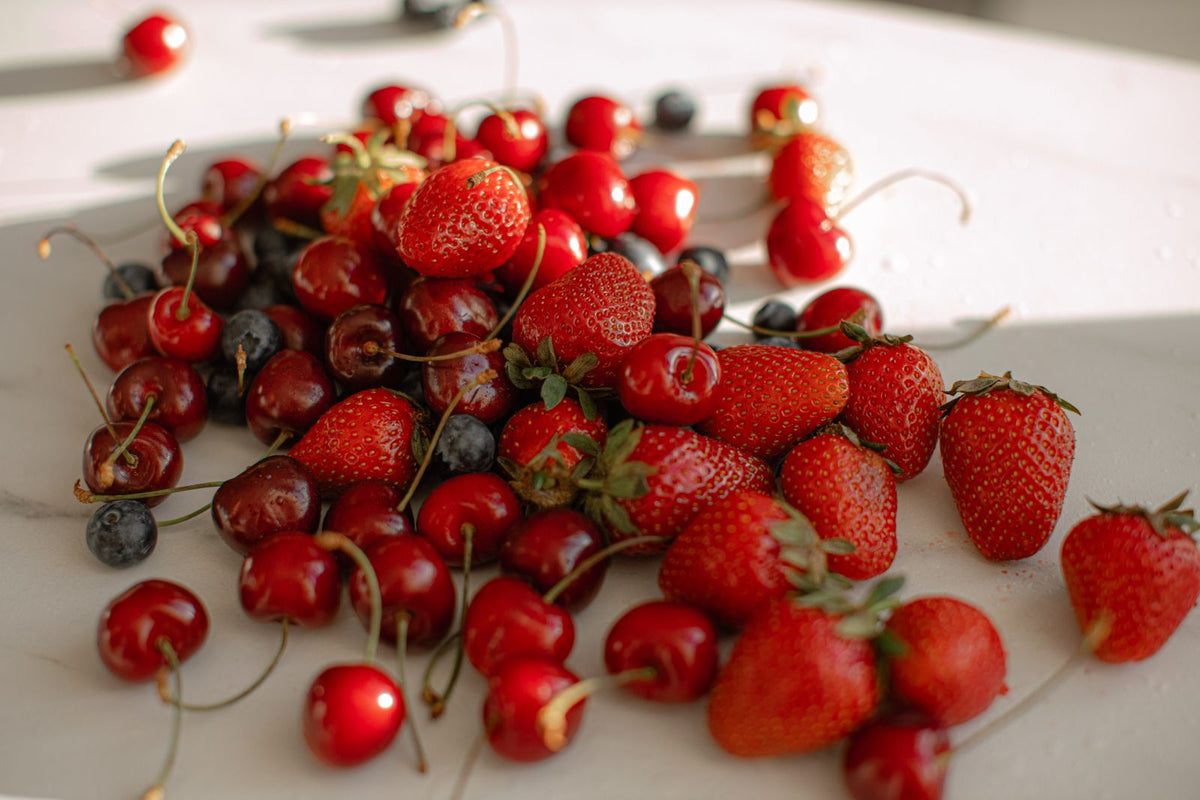 Fresh strawberries, cherries and blueberries
