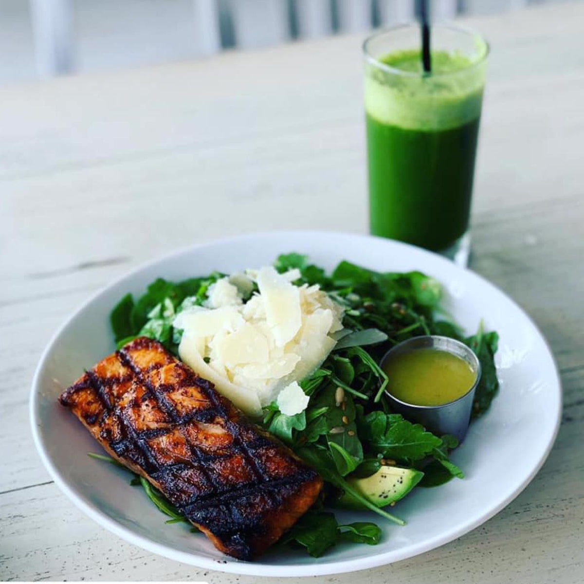 Grilled salmon salad with avocado