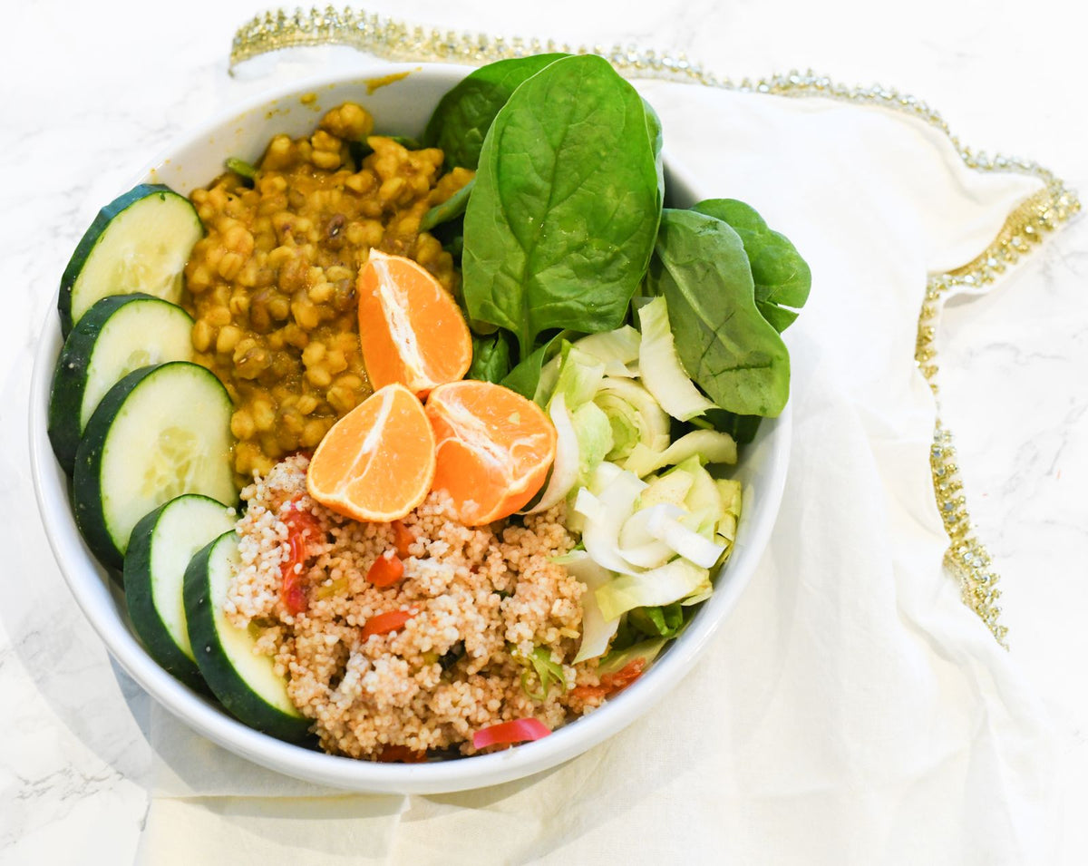 Healthy bowl of fresh vegetables, grains and fruit
