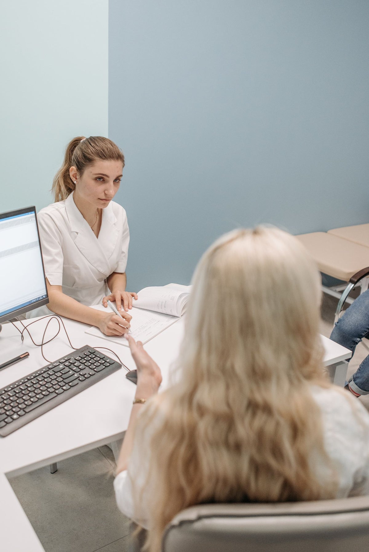 Doctor talking with a patient in an office