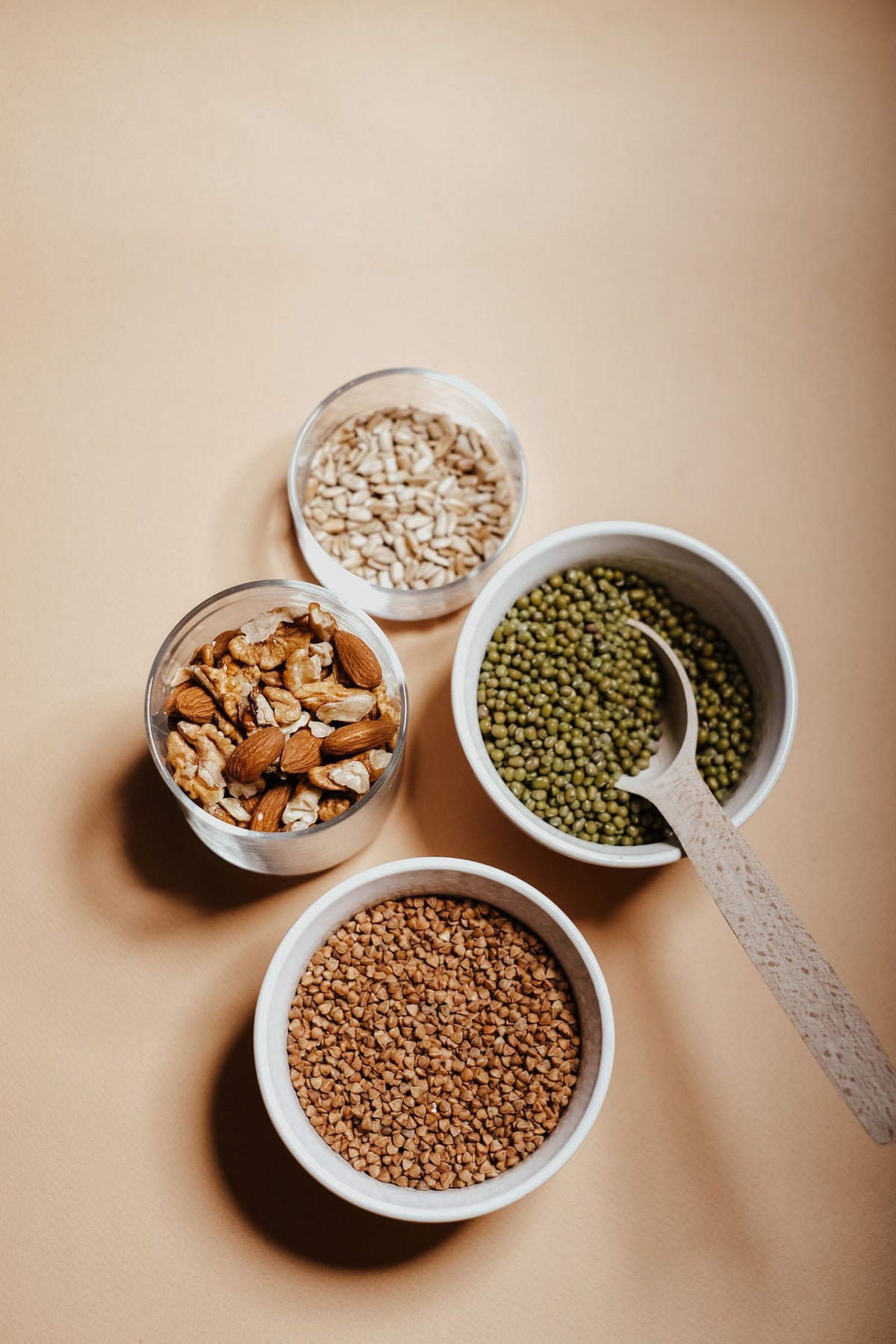 Grains and seeds in glass jars and bowls