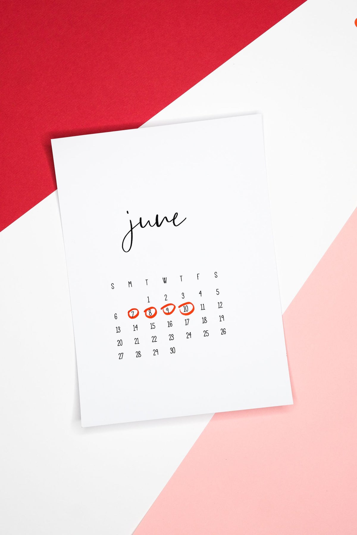 Calendar with dates marked in red